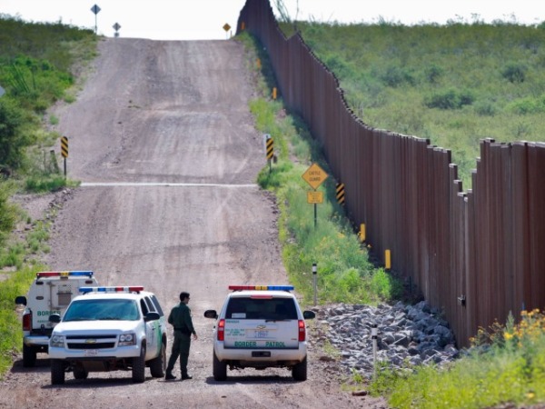 border-patrol-cars-fence